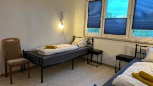 Postel nebo postele na pokoji v ubytování MiCasa TuCasa - 4-R-Apartment Leipziger Neuseenland Sirius