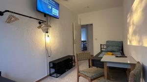TV a/nebo společenská místnost v ubytování MiCasa TuCasa - 4-R-Apartment Leipziger Neuseenland Sirius