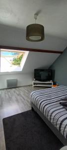 Μια τηλεόραση ή/και κέντρο ψυχαγωγίας στο Chambre circuit des 24 heures