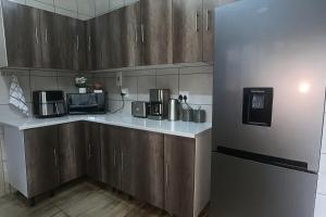 Kuchyň nebo kuchyňský kout v ubytování The Bloemhof Stay