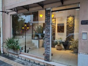 a store front with a window with plants in it at Refugio Urbano 2 in Corrientes