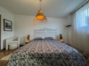 En eller flere senge i et værelse på LUrban Garden - 6pers - Jardin - Circuit Bugatti + 3 billeder