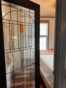 Ένα ή περισσότερα κρεβάτια σε δωμάτιο στο Boho Bungalow