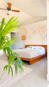 Ένα ή περισσότερα κρεβάτια σε δωμάτιο στο Amelia Casa Hotel