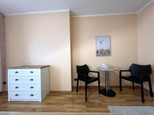 Posezení v ubytování Simplex Stays Freiburg Schreiberstraße + 8 fotografií