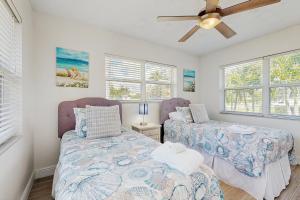 Ένα ή περισσότερα κρεβάτια σε δωμάτιο στο Pompano Beach Getaway +19 φωτογραφίες