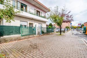 a brick sidewalk in front of a building at Villa Trieste in Marghera