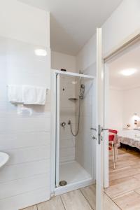 a bathroom with a shower and a sink at Villa Trieste in Venice