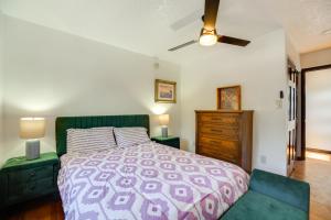 a bedroom with a large bed and a dresser at Less Than 1 Mi to Santa Fe Plaza Mtn-View Gem with Hot Tub! in Santa Fe
