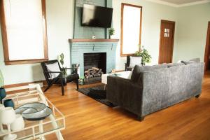a living room with a couch and a fireplace at 718 Morgan Ave in Harriman