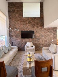 Posezení v ubytování Luxurious house in Puebla