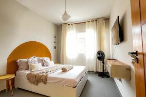 Postel nebo postele na pokoji v ubytování Apartamento Moderno no Visconde com Cozinha completa, Smart TV e Wifi