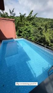 La alberca dentro o cerca de Atlantis villa no 421 2 fotos más