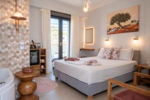 Giường trong phòng chung tại Eressian Lodgings - Skala Eressos +197 ảnh