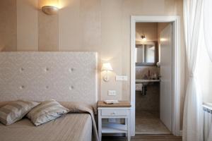 Postel nebo postele na pokoji v ubytování Il Barlanzone Affittacamere