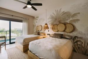 Ένα ή περισσότερα κρεβάτια σε δωμάτιο στο Palmas Apartment with Private Pool in Huatulco Bays +39 φωτογραφίες