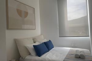 Voodi või voodid majutusasutuse Apartamento santa marta sui bello horizonte+playa+ac+pool+beach toas +37 fotot