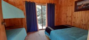 Postel nebo postele na pokoji v ubytování Glamping El Risco