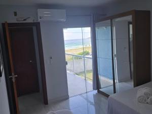 Ένα ή περισσότερα κρεβάτια σε δωμάτιο στο Espaço Lar SR +5 φωτογραφίες