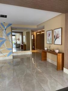 Ο χώρος του λόμπι ή της ρεσεψιόν στο Apartamento Alto padrão 2 suites com Vista para o Mar