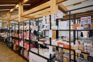 a store filled with lots of different types of food at 布袋屋 Hoteiya in Nara
