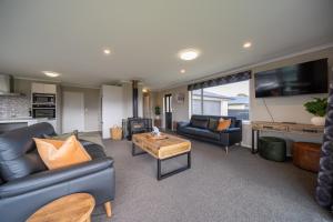 Kuchyň nebo kuchyňský kout v ubytování Fiordland Vista Lodge - Te Anau Holiday Home