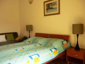 Ένα ή περισσότερα κρεβάτια σε δωμάτιο στο One Bedroom Apartment A3