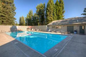 a swimming pool in the backyard of a house at 382 Sunburst in Big Sky
