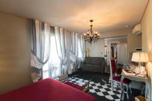 Posteľ alebo postele v izbe v ubytovaní Hotel Serenella