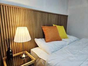 Ένα ή περισσότερα κρεβάτια σε δωμάτιο στο MINI HOUSE Gwangan Beach #closest to the beach #Fireworks Festival #drone show #cozy +53 φωτογραφίες