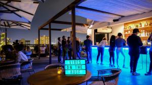a bar with a sign that reads unless on the roof at Suite Azul Miami - Private Guest Suite with Patio, Free Parking, Near Wynwood and Beaches in Miami