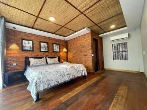 Giường trong phòng chung tại Sanctuary Homestay