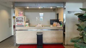 a front counter of a honoluluoluluoluluoluluoluluoluluoluluoluluoluluolulu at Hotel Tetora Makuhari Inagekaigan (Formerly Business Hotel Marine) in Chiba