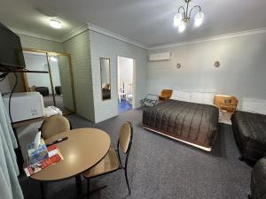 Ruang duduk di Colonial Motor Lodge Scone