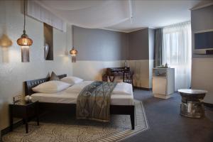 Postel nebo postele na pokoji v ubytování Ringhotel Reubel + 37 fotografií