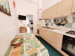 a kitchen with a table with a newspaper on it at Nei pressi del mare in Termoli