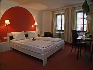 Postel nebo postele na pokoji v ubytování Hotel Beller