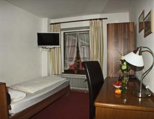 Postel nebo postele na pokoji v ubytování Hotel Beller