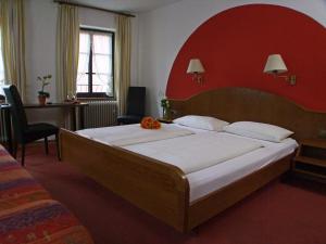 Postel nebo postele na pokoji v ubytování Hotel Beller