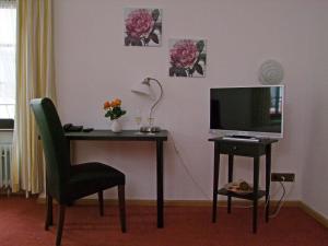 TV a/nebo společenská místnost v ubytování Hotel Beller
