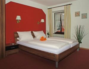 Postel nebo postele na pokoji v ubytování Hotel Beller