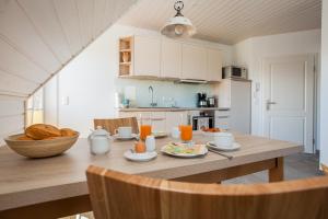 Η κουζίνα ή μικρή κουζίνα στο Ferienhaus Tura