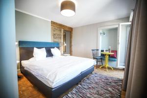 Postel nebo postele na pokoji v ubytování B&B Zum Schleif