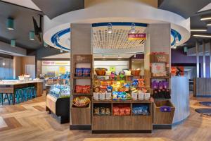 a store with a food counter in a store at Tru By Hilton Augusta Washington Road in Augusta