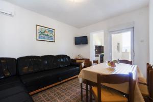 TV a/nebo společenská místnost v ubytování SAN Apartments