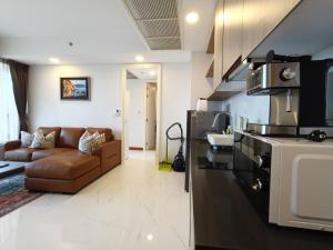 Η κουζίνα ή μικρή κουζίνα στο Zire Wongamat - 1 bedroom Condo with Seaview