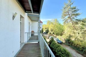 a balcony of a house with a car at WG Zimmer im Leipziger Westen in Leipzig