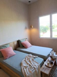 Postel nebo postele na pokoji v ubytování Villa Face a l'océan