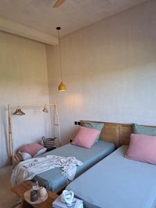 Postel nebo postele na pokoji v ubytování Villa Face a l'océan