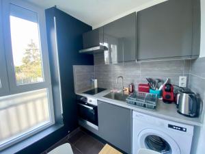 Køkken eller tekøkken på Résidence 4T - 33 bis Avenue Gaston Chauvin